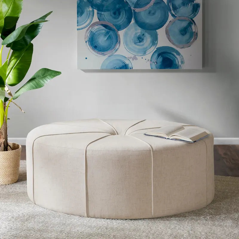 Pouf capitonné ovale surdimensionné